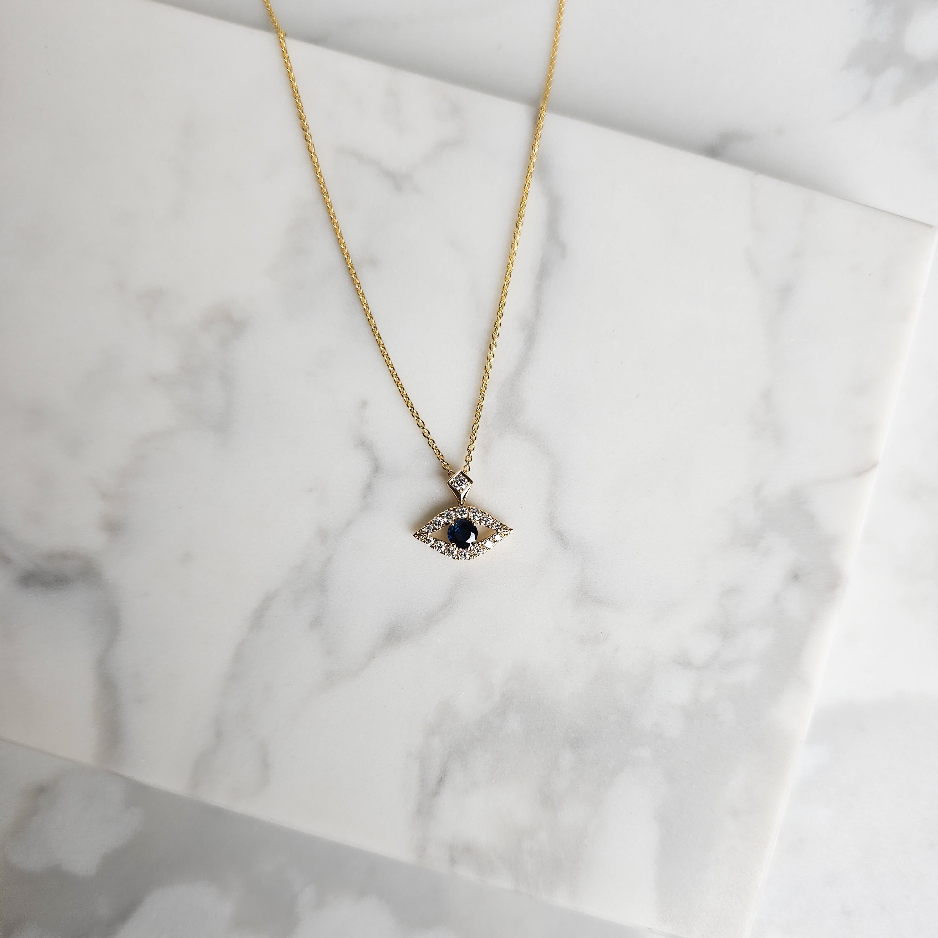 Yellow Gold Evil Eye Pendant Necklace with Diamonds & Sapphire