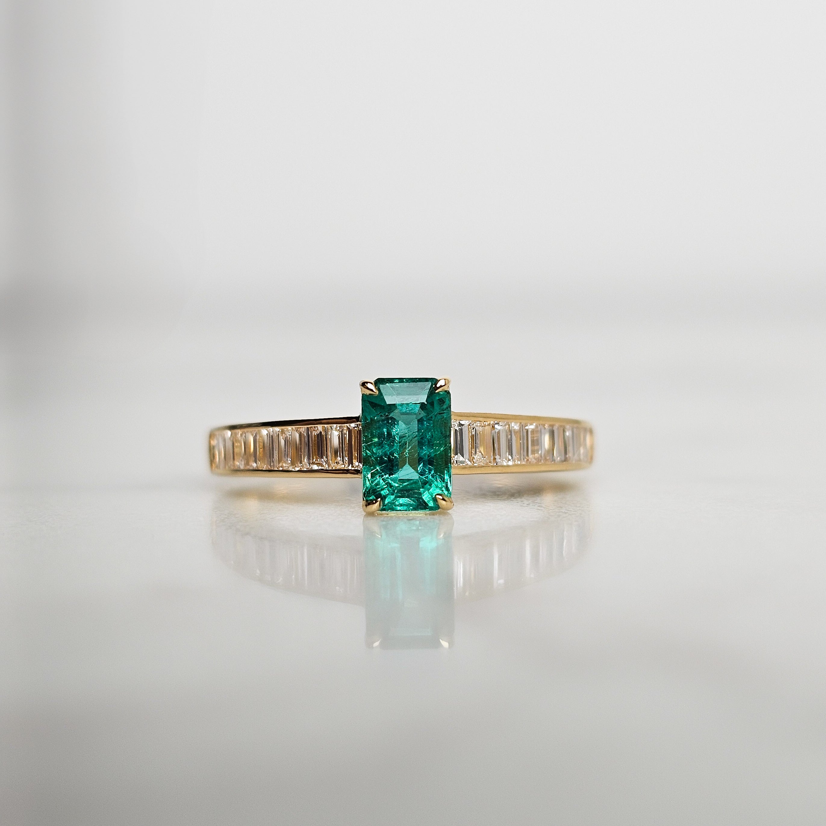 Emerald and Baguette Diamond Ring