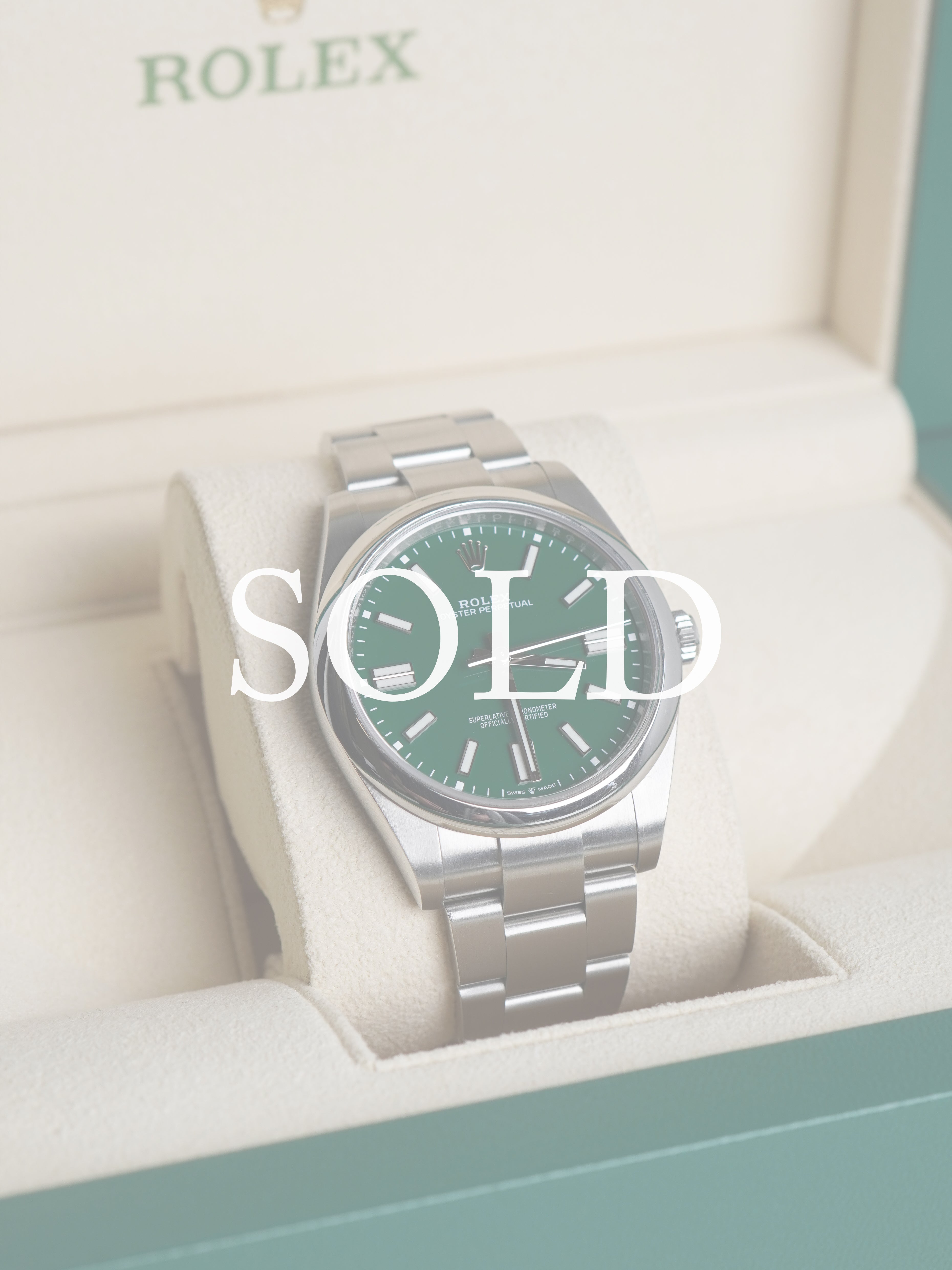 Rolex Oyster Perpetual Green Dial