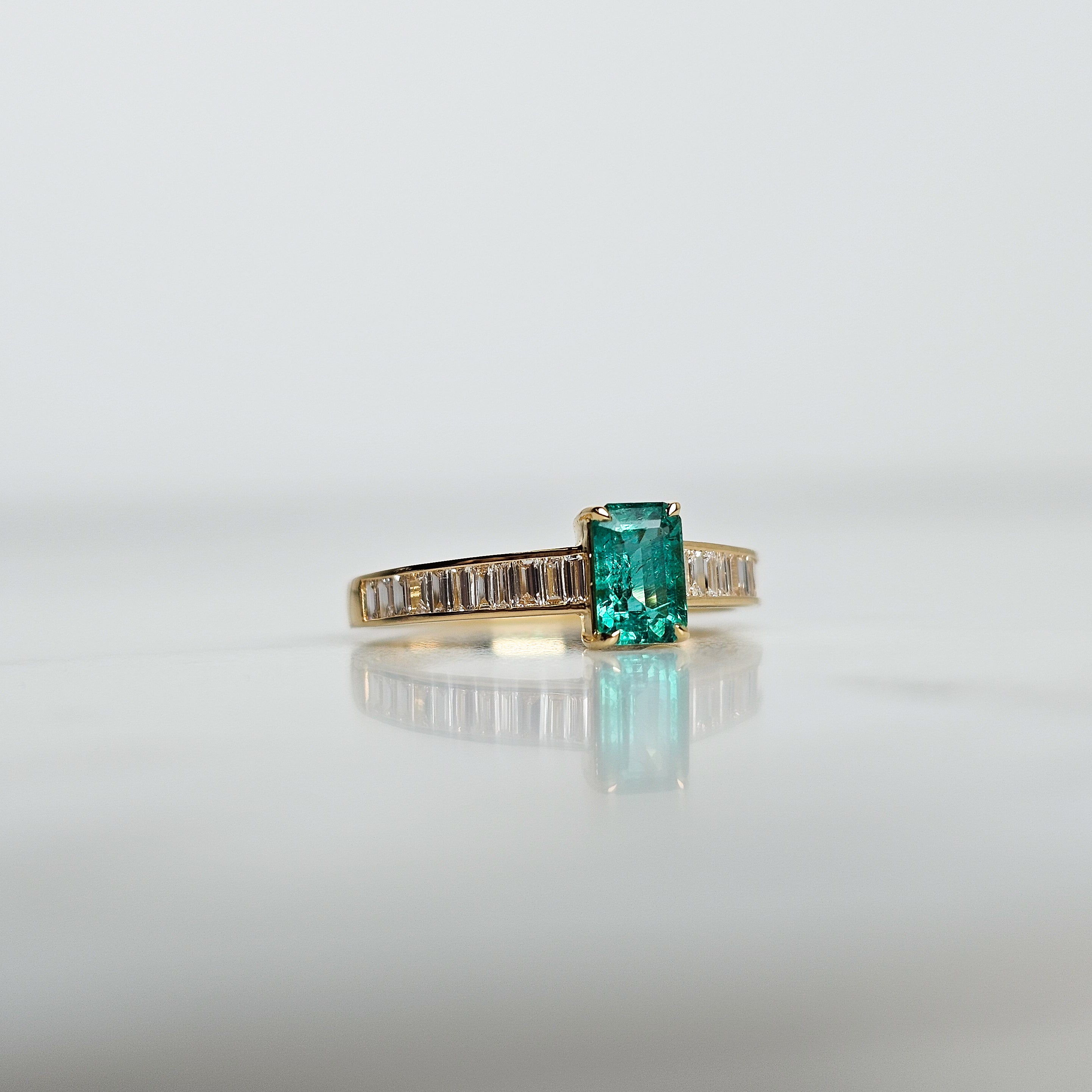 Emerald and Baguette Diamond Ring