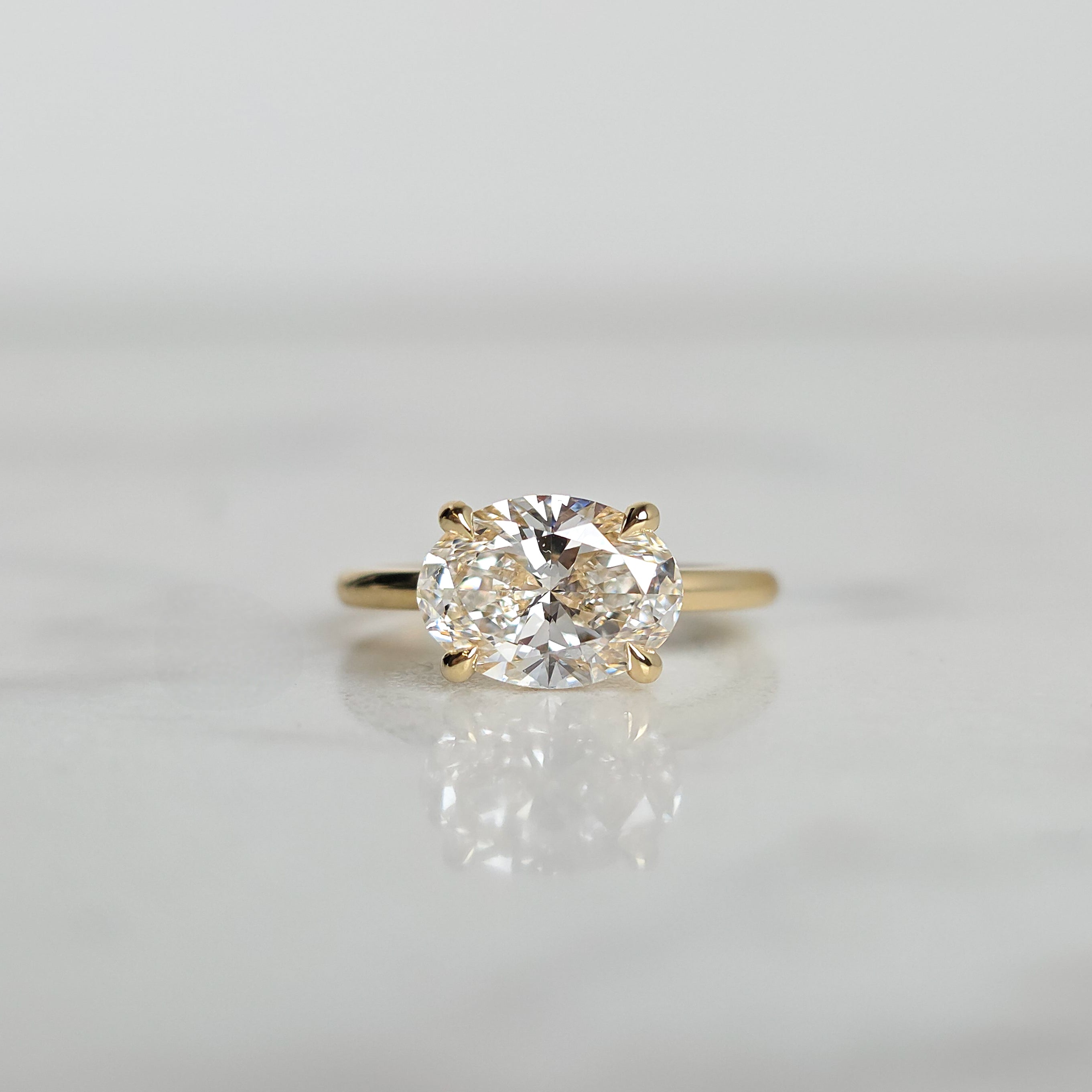 East/West Solitaire Engagement Ring