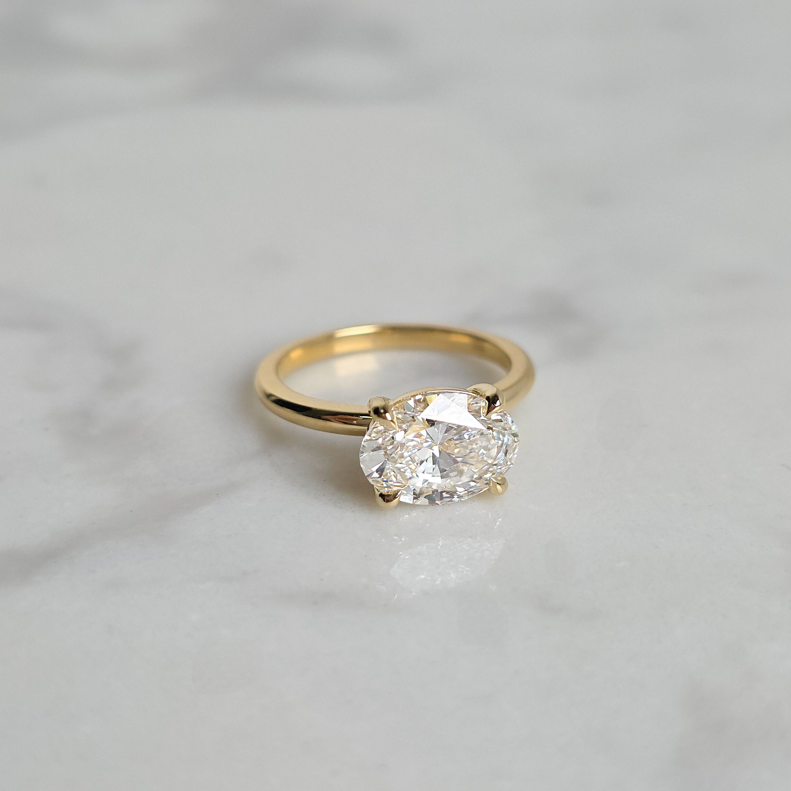 East/West Solitaire Engagement Ring